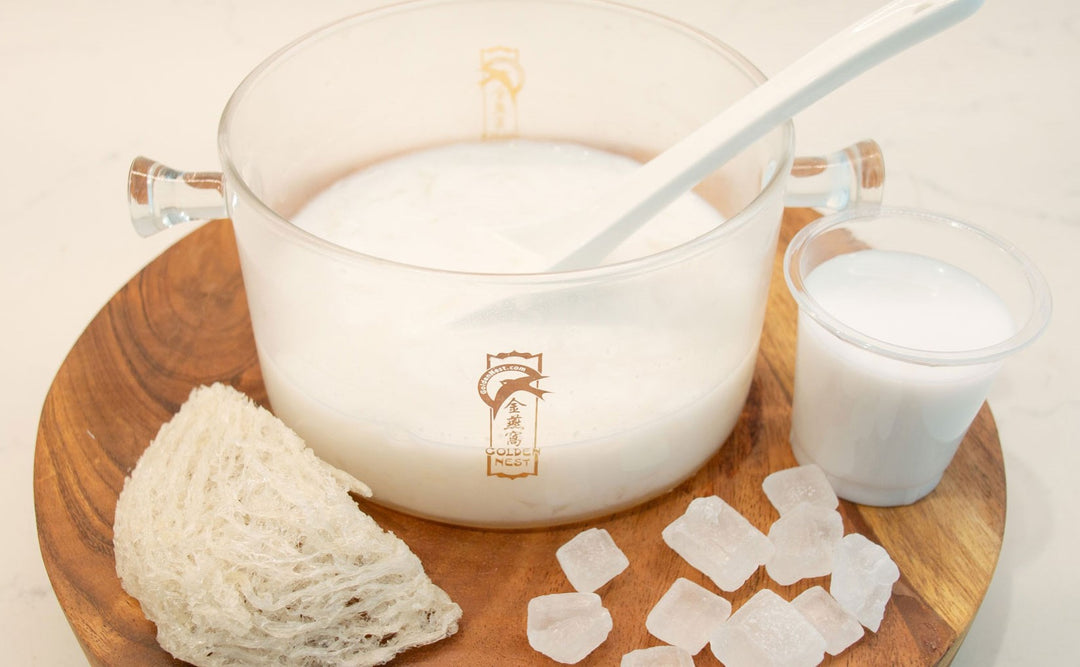 Image of glass cookware, a piece of Golden Nest's edible bird's nest, coconut milk, and rock sugar.