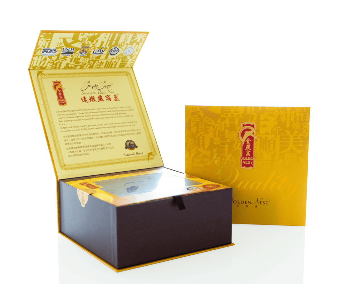 金燕窝高级金燕窝产品的开盒包装,以金色和棕色为主色调,内有印章和质量证书。