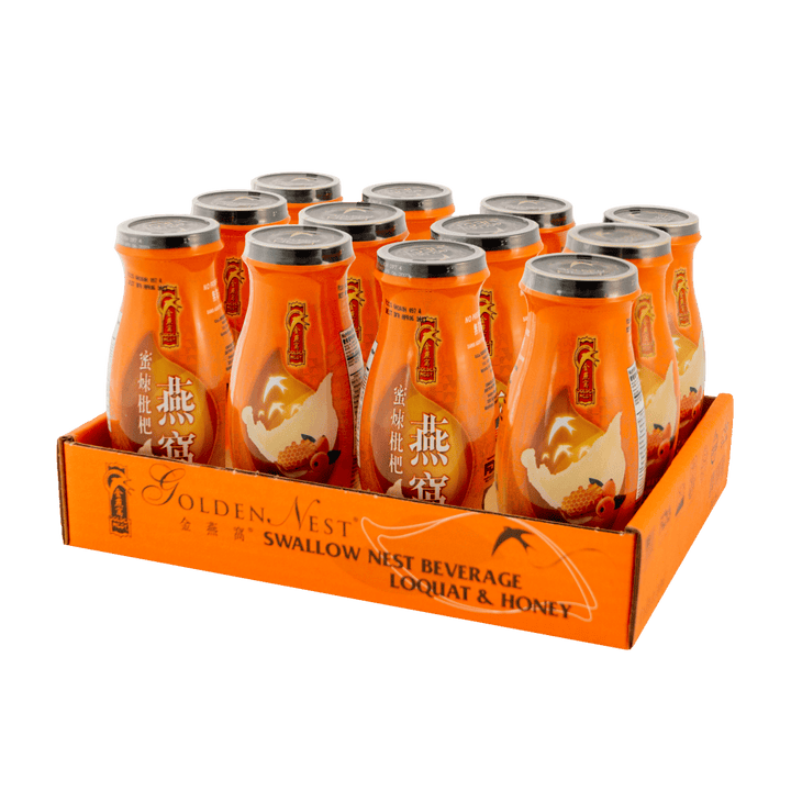 A vibrant orange display box filled with bottles of Golden Nest Swallow Nest Beverage with loquat and honey, showcasing its attractive design.