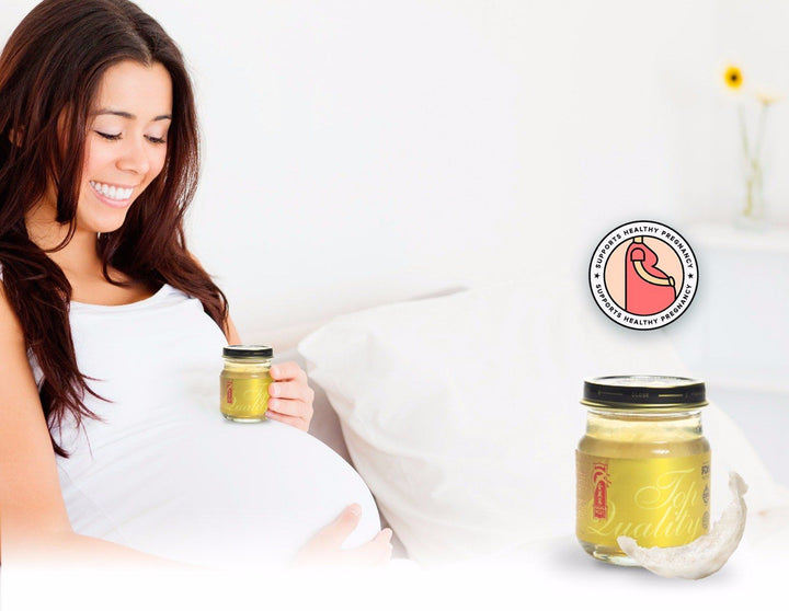 Pregnant woman holding bottle of Gift Pack Bird’s Nest Soup - Original Rock Sugar. Bird nest soup gift for pregnant women