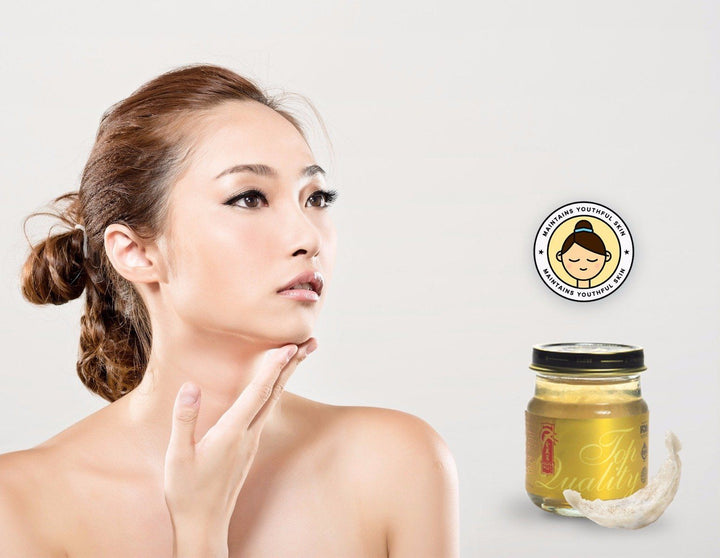 Beautiful woman with bottle of Gift Pack Bird’s Nest Soup - Original Rock Sugar. Bird nest soup for mom